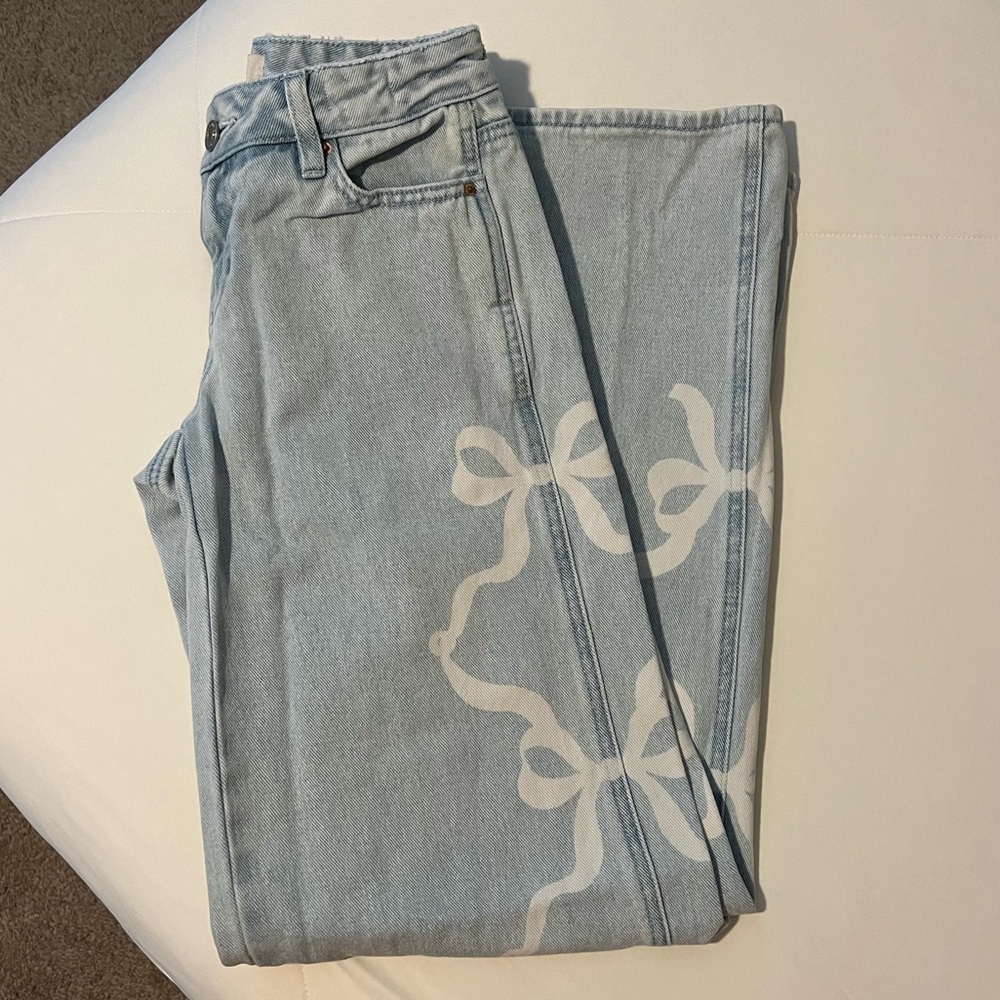 Light Blue Women's Jeans with white bows up sides - flare